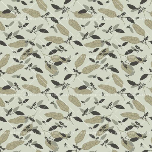 Pattern designs The image features a green background adorned with a vibrant pattern of large leaves. The leaves are depicted in various shades of green and beige, creating a visually striking and detailed design. This fabric pattern highlights the intricate beauty of nature, showcasing the diversity of leaf shapes and colors