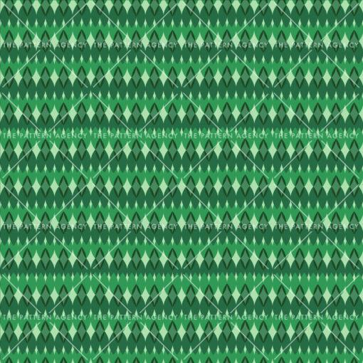 A seamless pattern with light green and dark green leaves on a white background. The pattern consists of realistic leaves in different shapes and sizes. The pattern is repeated horizontally and vertically to create an endless surface.