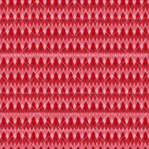 A seamless pattern of geometric shapes in shades of red and pink adorns a red background. The pattern consists of interconnected rhombuses and triangles that create a dynamic composition. The repetitive design gives a feeling of infinity and the direction of the movement can be perceived in different ways depending on the viewer's perspective.